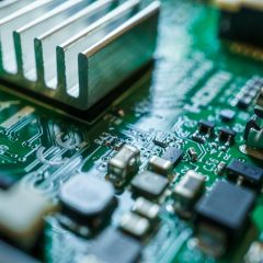 green and white computer ram stick