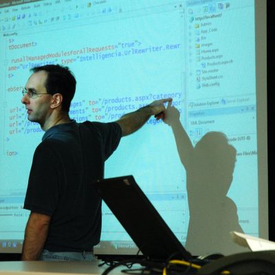 Photo by Wonderlane man in black crew neck t-shirt using black laptop computer