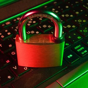 Photo by FlyD red padlock on black computer keyboard