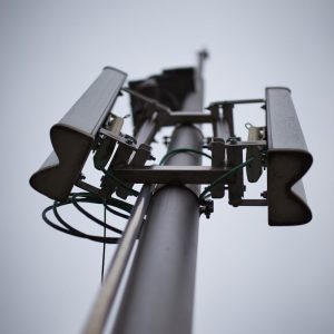 Photo by Jonas Stolle black and gray electric post